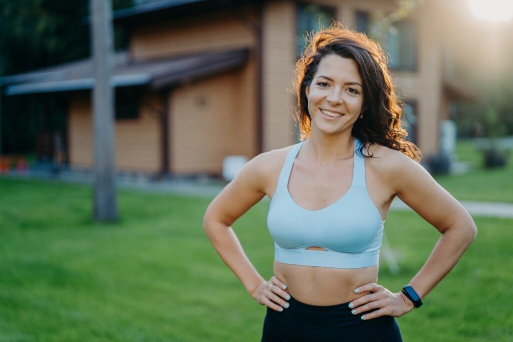 Woman with toned arms and stomach from a CoolTone Treatment in Wayzata