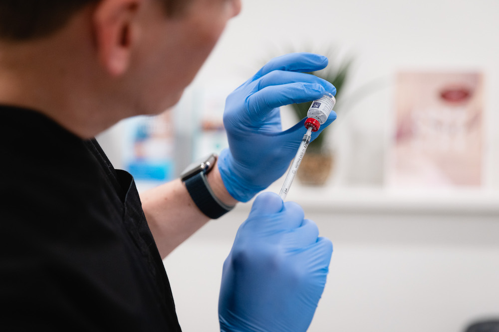 Vively provider preparing needle for Botox brow lift in Minneapolis